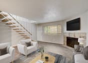 Thumbnail 1 of 23 - a living room with white furniture and a staircase and a tv