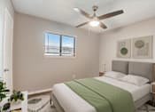 Thumbnail 16 of 42 - a bedroom with a bed and a ceiling fan