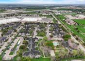 Thumbnail 40 of 42 - an aerial view of a neighborhood with houses and lawns