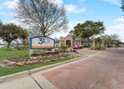 Thumbnail 42 of 42 - the front of a house with a 30th sign in front of it