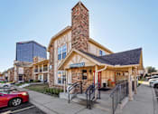 Thumbnail 9 of 35 - A building with a sign that says "VISITING OFFICE" is shown.