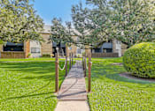 Thumbnail 30 of 42 - our apartments showcase a beautiful lawn