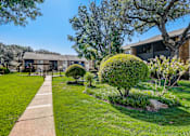 Thumbnail 31 of 42 - our apartments showcase a beautiful lawn