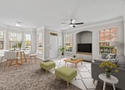 Thumbnail 1 of 52 - a living room with a couch and a table with chairs