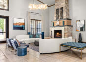 Thumbnail 20 of 28 - a living room filled with furniture and a fireplace