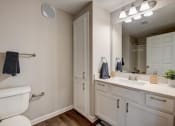 Thumbnail 18 of 48 - a bathroom with a toilet sink and mirror