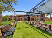 Thumbnail 11 of 19 - the reserve at bucklin hill courtyard with picnic tables and benches