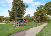Thumbnail 39 of 44 - a kiosk in a park next to a path