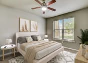 Thumbnail 5 of 33 - an empty bedroom with a ceiling fan and a bed