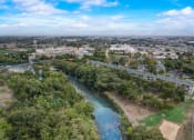 Thumbnail 41 of 44 - an aerial view of the river and the city