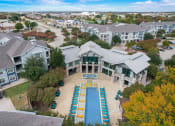 Thumbnail 34 of 50 - an aerial view of a house with a swimming pool
