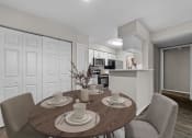Thumbnail 3 of 29 - a dining room and kitchen with a table and chairs