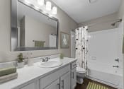 Thumbnail 9 of 29 - the preserve at ballantyne commons apartment bathroom with shower and sink and large mirror