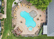 Thumbnail 61 of 70 - A large outdoor pool with a sign that says "MUJIN".