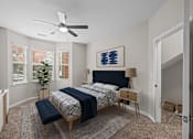 Thumbnail 5 of 52 - a bedroom with a large bed and a ceiling fan
