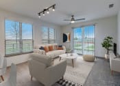 Thumbnail 2 of 44 - a living room with a couch and chairs and a table