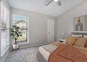 Thumbnail 8 of 15 - a bedroom with a bed and two windows and a ceiling fan