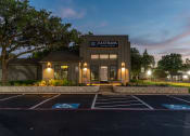 Thumbnail 40 of 41 - a rendering of the exterior of a building with a parking lot