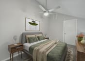 Thumbnail 9 of 28 - a bedroom with a large bed and a ceiling fan