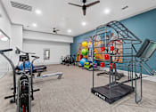 Thumbnail 43 of 52 - the preserve at ballantyne commons fitness room with bikes and weights