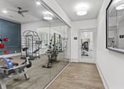 Thumbnail 46 of 52 - the gym in the owners home is equipped with a treadmill and weights