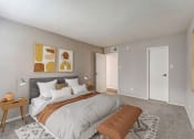 Thumbnail 5 of 27 - a bedroom with a large bed and a closet