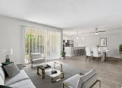 Thumbnail 14 of 41 - our apartments offer a living room with a couch a coffee table and a dining table