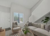 Thumbnail 1 of 28 - a living room with a couch and a chair and a window