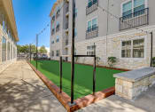 Thumbnail 30 of 36 - our apartments have a spacious courtyard with a green lawn and a basketball court
