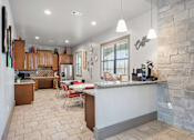 Thumbnail 23 of 36 - a view of the kitchen and dining area from the living room