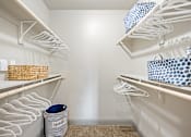 Thumbnail 13 of 36 - plenty of closet space in the laundry room at the enclave at woodbridge apartments in sugar land