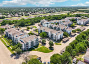 Thumbnail 39 of 40 - an aerial view of a neighborhood with houses and trees