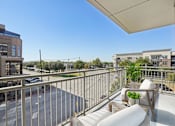 Thumbnail 23 of 55 - A view of Plano, Texas from an apartment balcony.