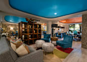 Thumbnail 23 of 45 - a living room filled with furniture and a large window