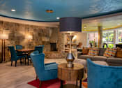 Thumbnail 15 of 45 - a living room filled with furniture and a large window