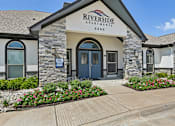 Thumbnail 12 of 36 - the front of the riverside apartments building