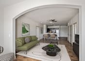 Thumbnail 11 of 39 - a living room with a green couch and a coffee table