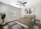 Thumbnail 5 of 39 - a bedroom with a bed and a ceiling fan