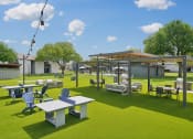 Thumbnail 28 of 41 - a rendering of a park with tables and chairs and a pavilion