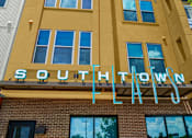 Thumbnail 35 of 35 - the sign for south town on the side of a building