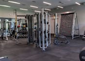 Thumbnail 35 of 50 - a view of the fitness center with a variety of exercise equipment