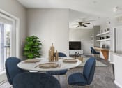 Thumbnail 1 of 24 - an open living room with a dining room table and chairs
