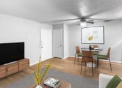 Thumbnail 2 of 15 - an open living room and dining room with a table and chairs