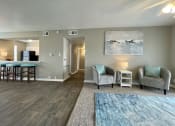 Thumbnail 16 of 31 - a living room with a couch and a chair  at The Alara, Houston, 77060
