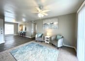Thumbnail 15 of 31 - a living room with two couches and a rug  at The Alara, Houston, TX