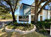 Thumbnail 10 of 30 - a sign with the address of a home with trees in the background  at 2151 Kirkwood, Houston, TX, 77077