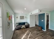 Thumbnail 8 of 31 - a living room with a couch and table  at The Alara, Houston, 77060