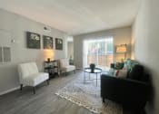 Thumbnail 19 of 30 - a living room with a couch and two chairs  at 2151 Kirkwood, Houston, TX, 77077