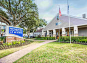 Thumbnail 3 of 15 - A sign for Providence at Heights is in front of a building.
