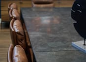 Thumbnail 41 of 77 - A row of brown leather chairs are lined up in front of a television.